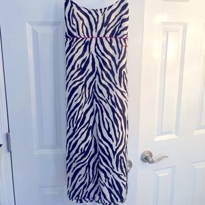 Small/petite. Knee length with slits on both sides